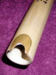 Quena of bamboo with wood inlay