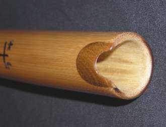 Quena of bamboo with wood inlay